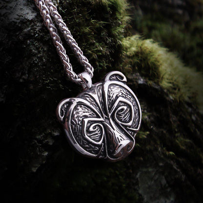 Viking Berserker Bear Totem Necklace: Silver metal pendant with intricate bear head design on a chain.