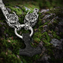 Viking black steel Mjolnir pendant on a Byzantine chain with wolf heads.
