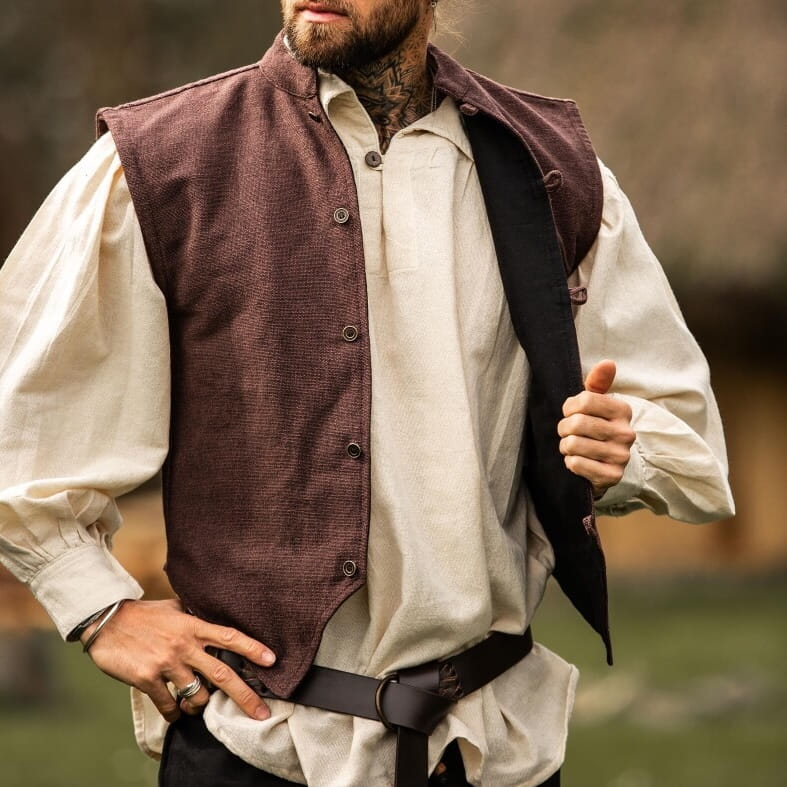 Brown handwoven cotton Viking vest with button front over a cream shirt.