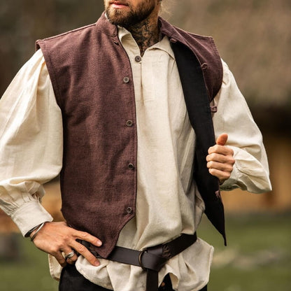 Brown handwoven cotton Viking vest with button front over a cream shirt.