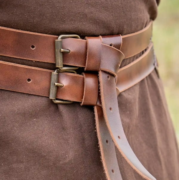 Brown faux leather Viking twin strap belt with antique brass buckles.