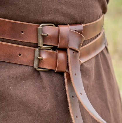 Brown faux leather Viking twin strap belt with antique brass buckles.