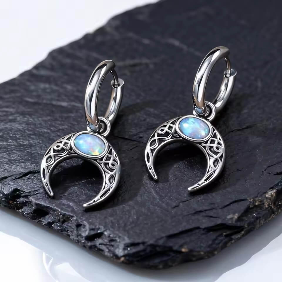 Viking Celtic crescent moon drop earrings with blue opal stone, silver-toned, intricate knotwork.