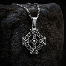 Viking Celtic Cross stainless steel pendant necklace with intricate knotwork design on a dark stone.
