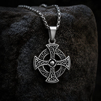 Viking Celtic Cross stainless steel pendant necklace with intricate knotwork design on a dark stone.