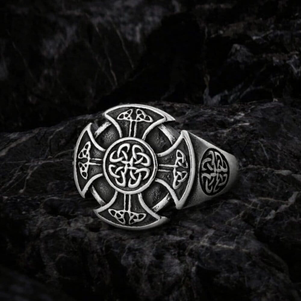 Viking Celtic Cross stainless steel ring with intricate knotwork design on a dark background.