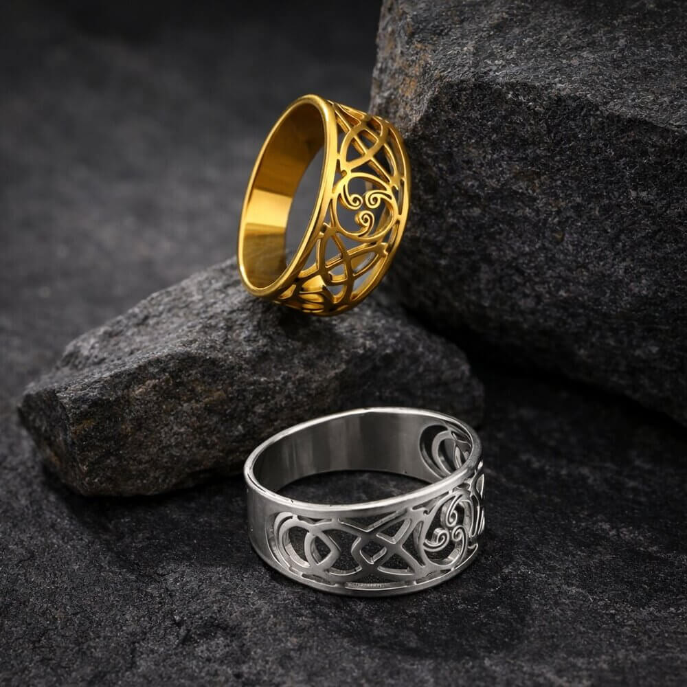 Viking Celtic Knot Filigree Stainless Steel Rings: one gold, one silver, with intricate openwork designs.