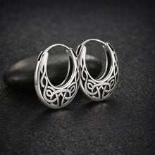 Viking Celtic knotwork oval hoop earrings in polished stainless steel.