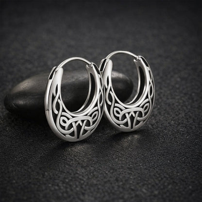 Viking Celtic knotwork oval hoop earrings in polished stainless steel.