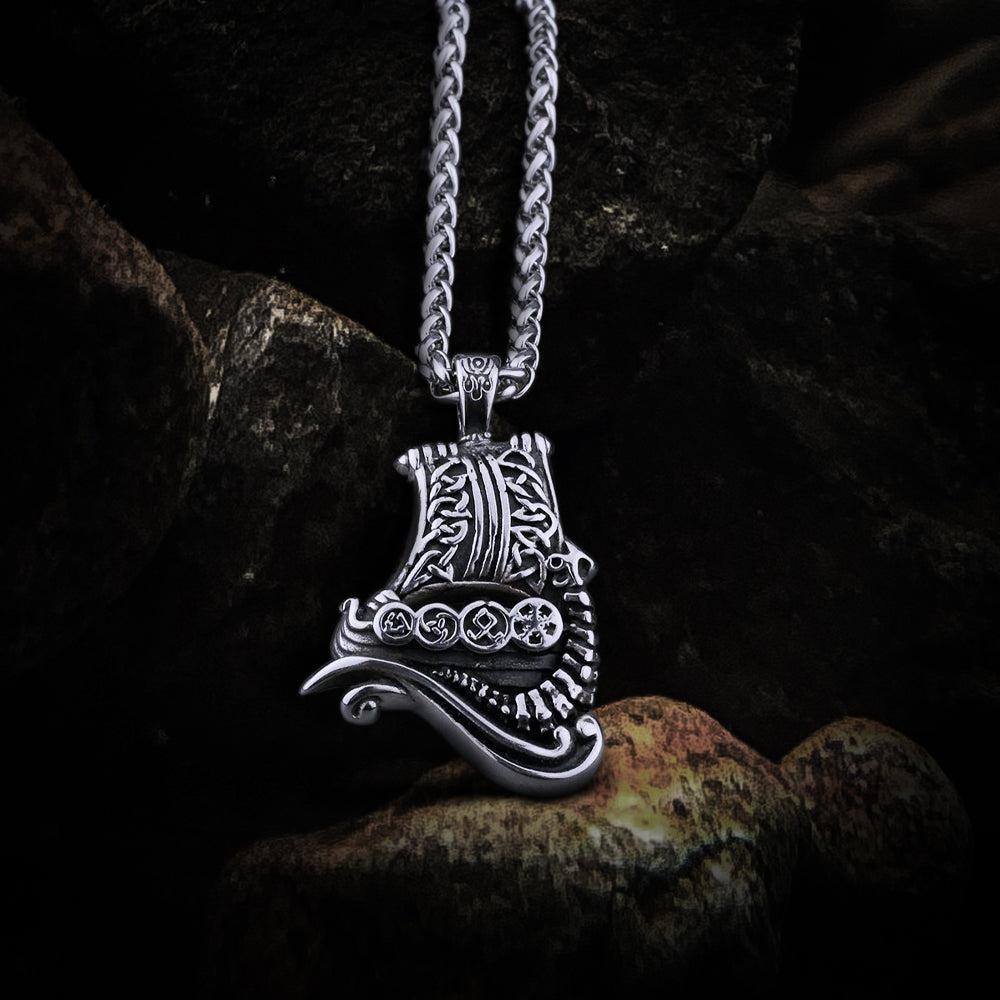 Viking dragon boat pendant, intricate stainless steel, silver-tone, on a matching chain.