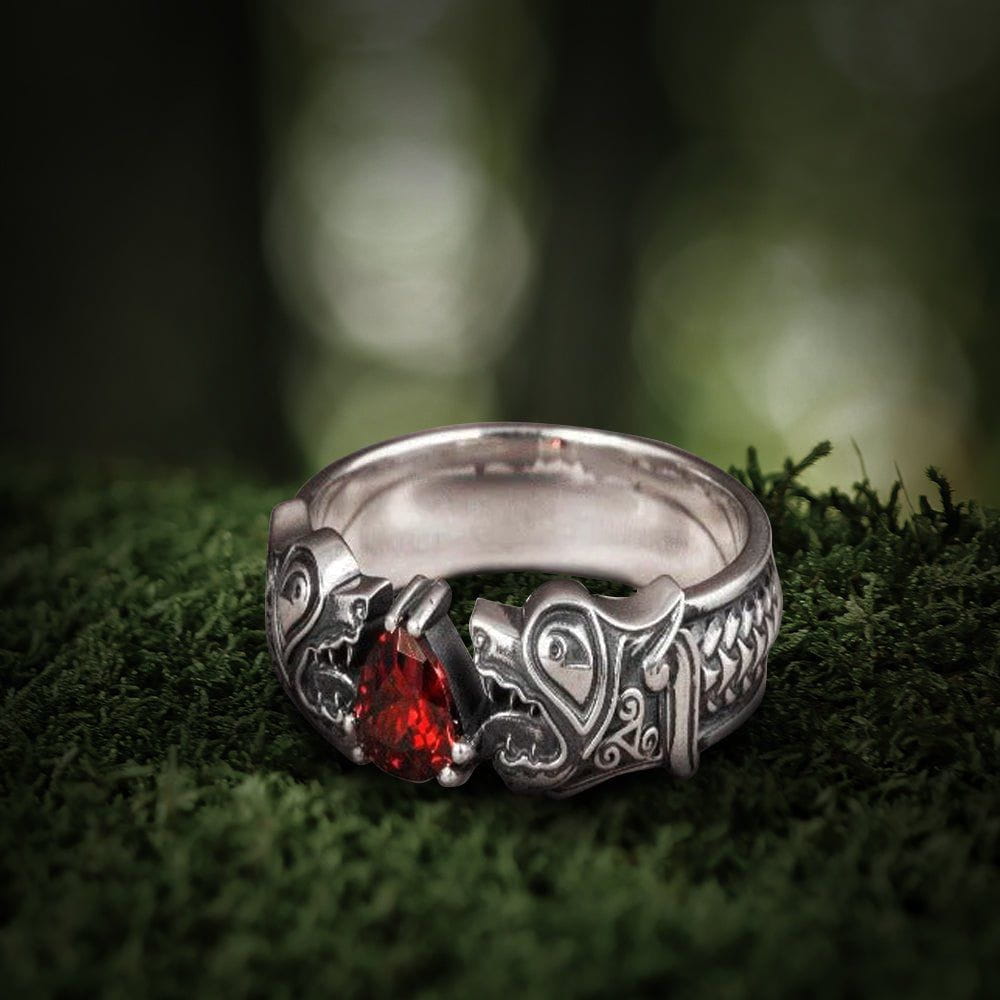 Sterling silver Viking Fenrir wolf ring with a deep red teardrop gem.