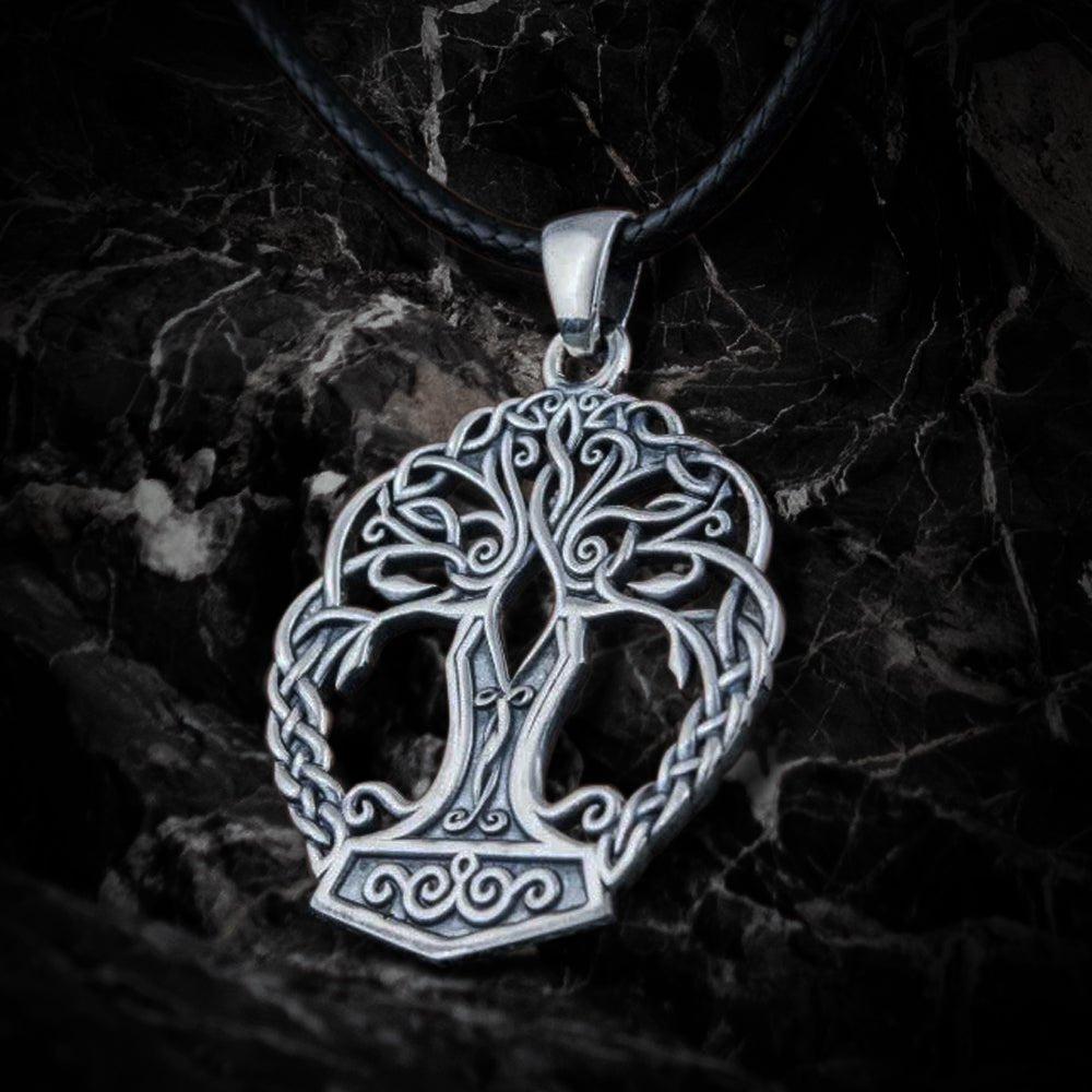 Sterling silver Viking Yggdrasil pendant with Mjolnir base on a black leather cord.