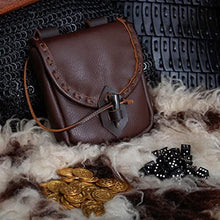 Viking dark brown leather belt pouch with horn toggle closure, gold coins, and dice on fur.