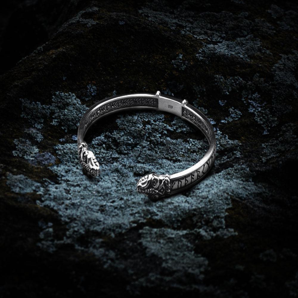 Silver Viking Jormungandr cuff bracelet with intricate dragon heads and Elder Futhark runes.