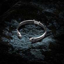 Silver Viking Jormungandr cuff bracelet with intricate dragon heads and Elder Futhark runes.