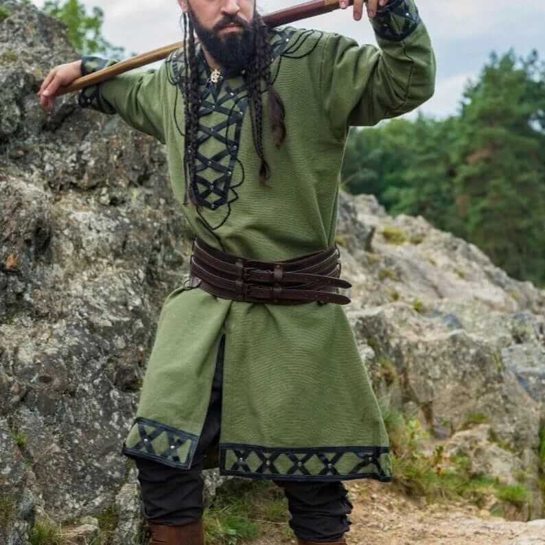 Viking tunic: green with black leather trim, lacing, and rivets.