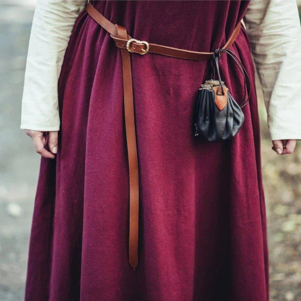 Brown leather Viking belt with brass buckle over a red tunic, featuring a small black pouch.