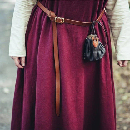 Brown leather Viking belt with brass buckle over a red tunic, featuring a small black pouch.