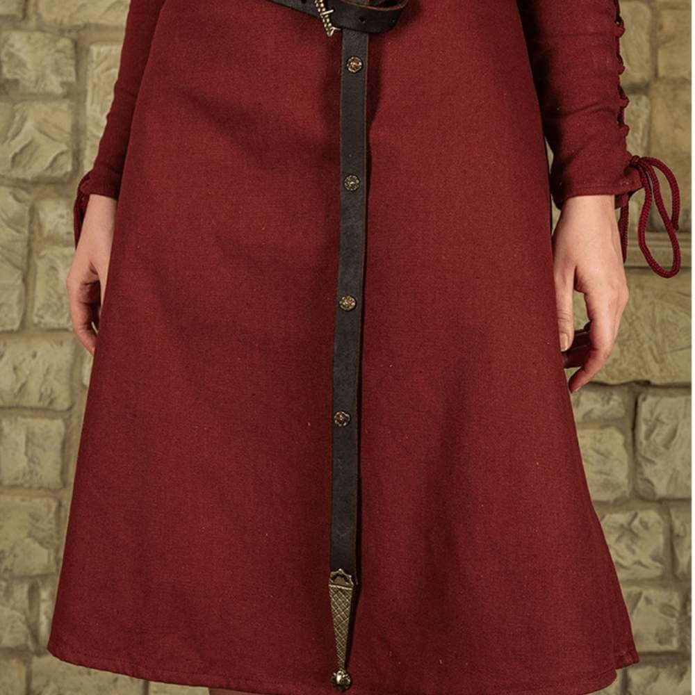 Viking lady's dark red tunic with a long black leather belt featuring ornate brass buttons and a decorative buckle.
