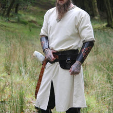 Natural linen Viking tunic with short sleeves and embroidered border.