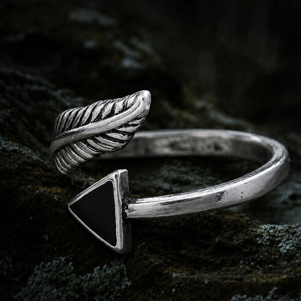Viking sterling silver open band ring with a detailed feather and black arrow tip design.