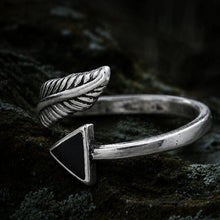 Viking sterling silver open band ring with a detailed feather and black arrow tip design.