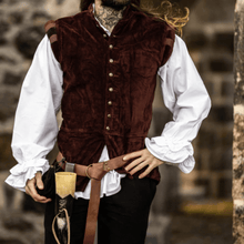 Red velvet Viking vest with gold button closure over a white ruffled shirt.