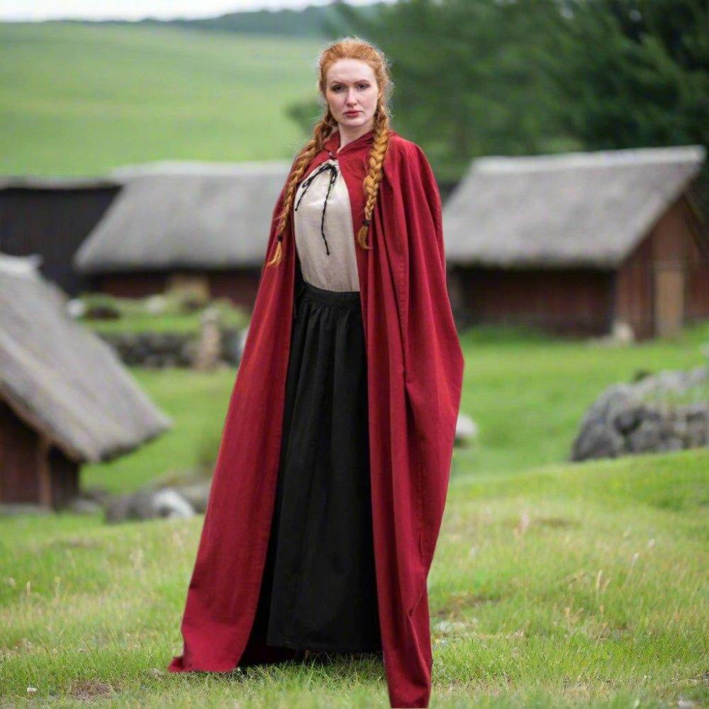 Red Viking summer-weight cotton cloak with hood, worn by a woman with braided red hair.