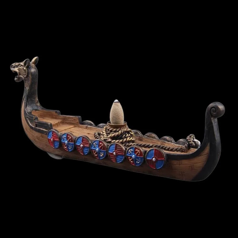Viking Drakkar warship incense burner, brown resin with colorful shields and a dragon prow.