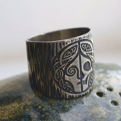 Viking stainless steel ring with a detailed skull face amulet and textured band.