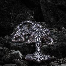 Viking silver-tone Mjolnir pendant with skull and Helm of Awe seal on a thick chain.
