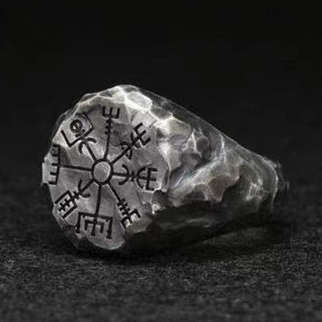 Viking stainless steel ring with a hammered finish and a black Vegvisir compass rune design.
