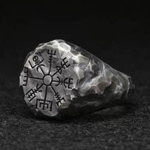 Viking stainless steel ring with a hammered finish and a black Vegvisir compass rune design.
