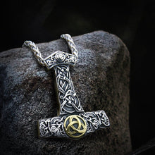 Viking Thor's Hammer Mjolnir necklace in steel with intricate Celtic knotwork and a gold Triquetra.