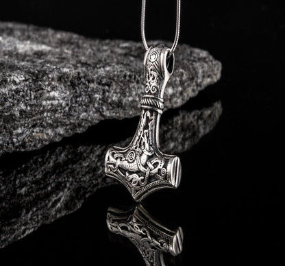 Viking Thor's Hammer Mjolnir pendant in sterling silver, featuring intricate Mammen style knotwork.
