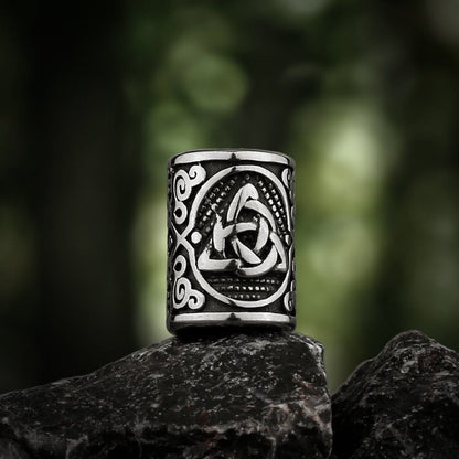 Viking Triquetra steel beard bead with intricate Celtic knotwork design.