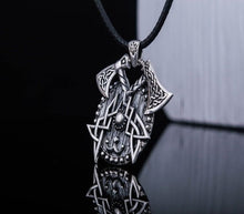 Sterling silver Viking axes and shield necklace with intricate Norse knotwork on a black cord.