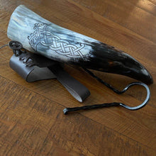 Viking drinking horn, natural gray/black, with Odin's Ravens design, leather belt loop, and iron stand.