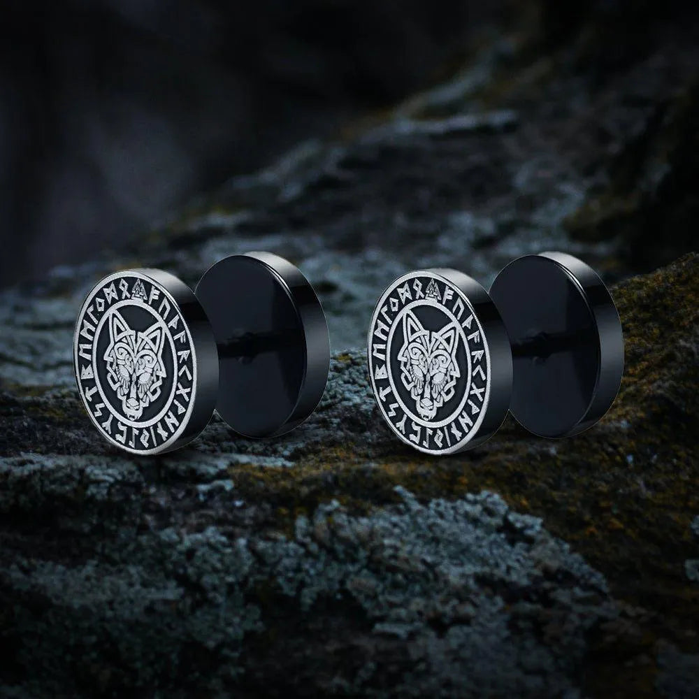 Pair of black Viking stud earrings with silver Norse wolf and runic symbols.