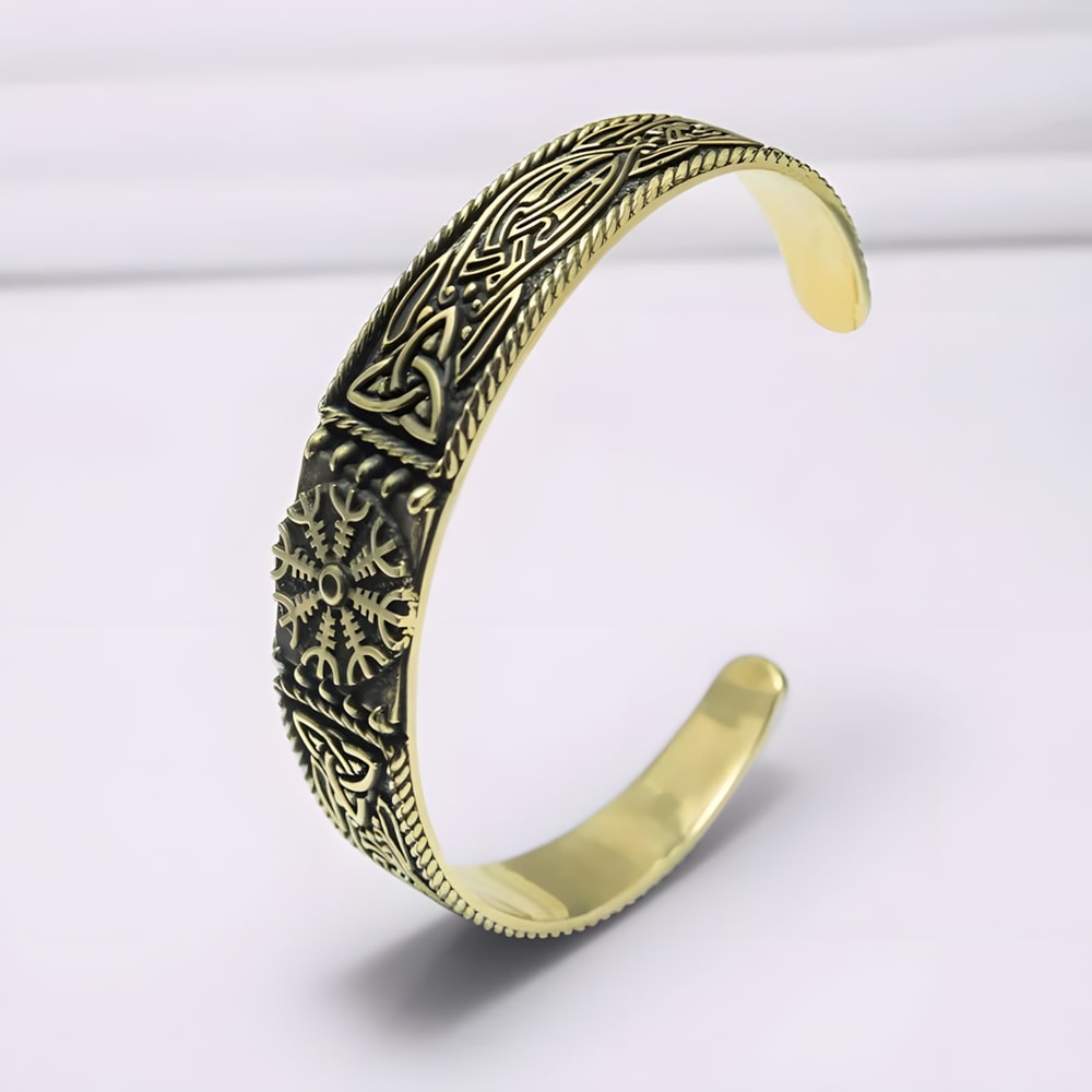 Viking Helm of Awe bronze cuff bracelet with intricate Celtic knotwork and runic designs.