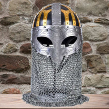 Viking full-face steel chainmail helmet with gold and black accents, intricate silver detailing.