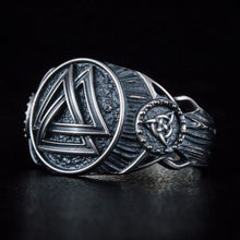 Viking sterling silver ring with a prominent Valknut symbol and intricate knotwork.