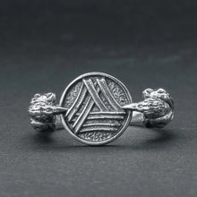 Viking Valknut Huginn Muninn silver ring with detailed raven heads on a dark background.