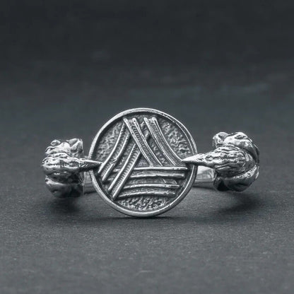 Viking Valknut Huginn Muninn silver ring with detailed raven heads on a dark background.
