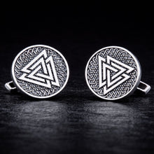 Viking Valknut silver cufflinks with intricate Celtic knotwork design on a dark background.