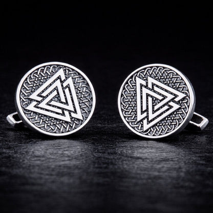 Viking Valknut silver cufflinks with intricate Celtic knotwork design on a dark background.