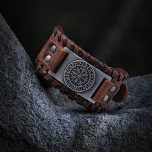 Viking brown leather cuff bracelet with a silver Vegvisir rune circle plate and buckle.