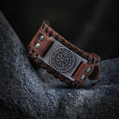 Viking brown leather cuff bracelet with a silver Vegvisir rune circle plate and buckle.