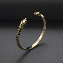 Viking Viper Serpent Bracelet: Gold-tone metal cuff with detailed snake heads and scale texture.