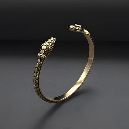 Viking Viper Serpent Bracelet: Gold-tone metal cuff with detailed snake heads and scale texture.